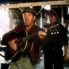 David Carradine est Woody Guthrie dans "En route vers la gloire" d'Hal Ashby